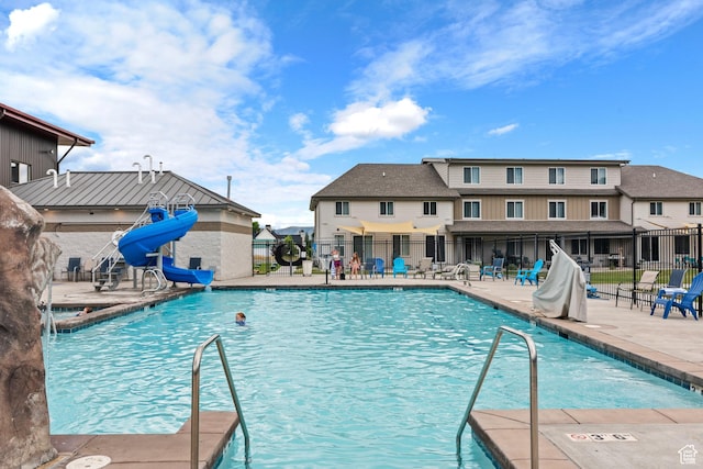 175 S Blue Topaz Ln, Garden City, UT 84028 - community pool featuring a patio area and a water slide