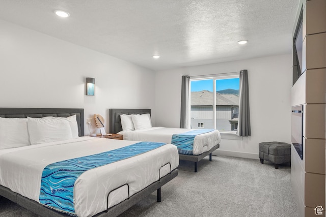 175 S Blue Topaz Ln, Garden City, UT 84028 - bedroom with carpet flooring, recessed lighting, and a textured ceiling