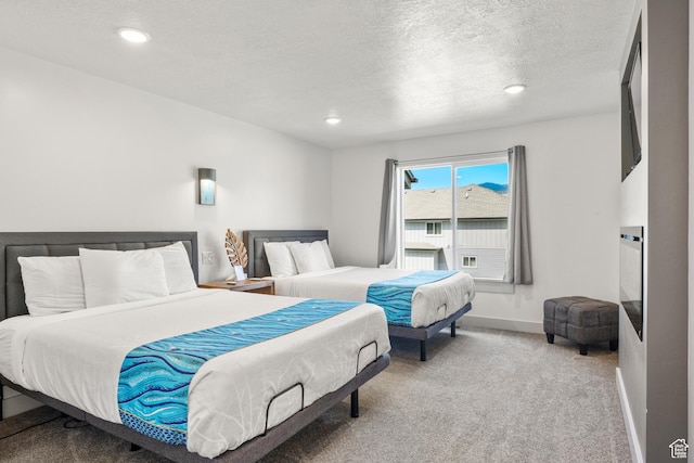 175 S Blue Topaz Ln, Garden City, UT 84028 - carpeted bedroom featuring a textured ceiling and recessed lighting