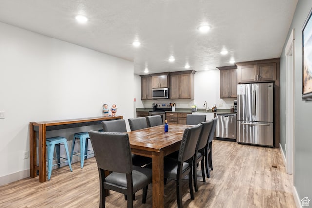 175 S Blue Topaz Ln, Garden City, UT 84028 - dining room featuring light wood-style flooring and recessed lighting