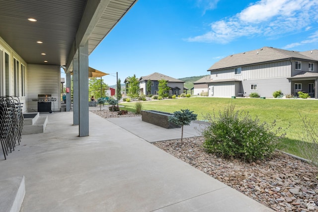 175 S Blue Topaz Ln, Garden City, UT 84028 - view of patio featuring a residential view and an outdoor kitchen
