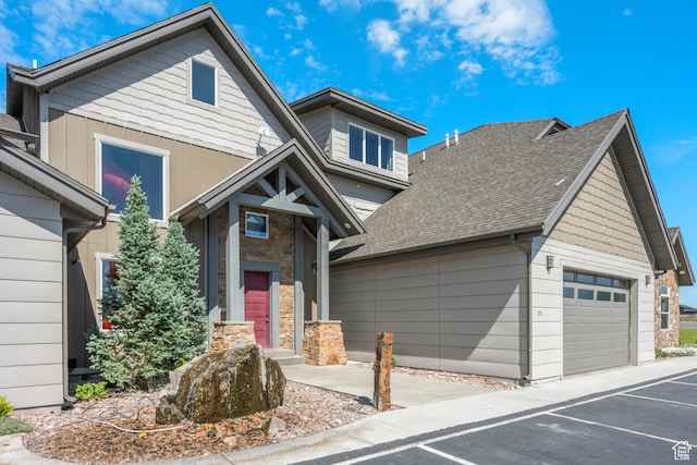 175 S Blue Topaz Ln, Garden City, UT 84028 - craftsman-style home featuring stone siding and a shingled roof