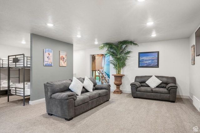 175 S Blue Topaz Ln, Garden City, UT 84028 - carpeted living room with recessed lighting and baseboards