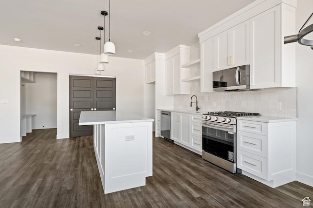 2639 S Mann Ln, Cedar City, UT 84720 - kitchen featuring stainless steel appliances, open shelves, tasteful backsplash, and light countertops