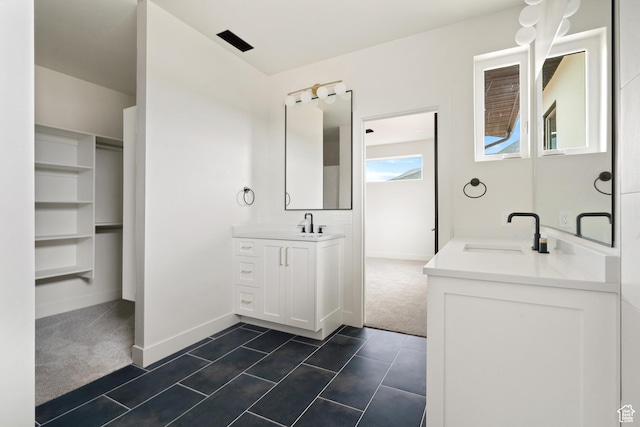 2639 S Mann Ln, Cedar City, UT 84720 - bathroom with two vanities and tile patterned floors