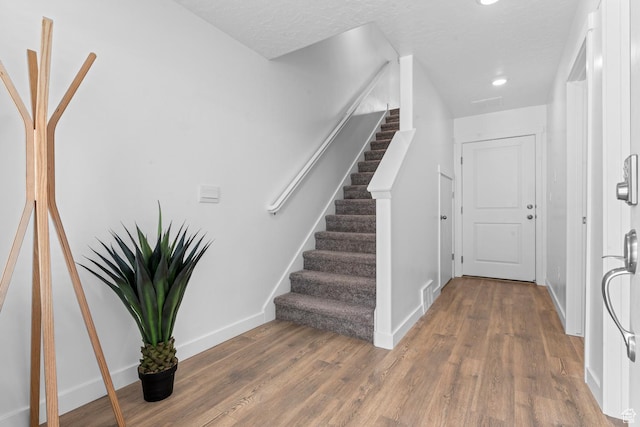 1282 N 375 E Unit 150, Harrisville, UT 84404 - entryway with stairs, wood finished floors, and recessed lighting
