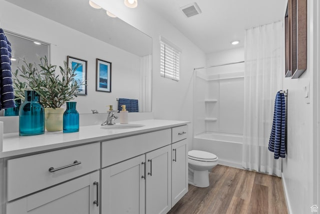 1282 N 375 E Unit 150, Harrisville, UT 84404 - bathroom with vanity, wood finished floors, shower / bath combo with shower curtain, and recessed lighting