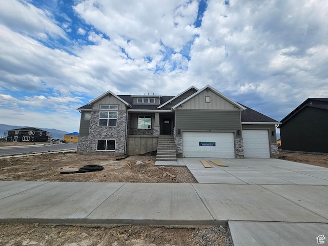 1726 S 3875 W Unit 225, West Weber, UT 84401 - craftsman-style home featuring stone siding, board and batten siding, an attached garage, and concrete driveway