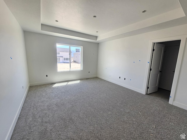 1726 S 3875 W Unit 225, West Weber, UT 84401 - carpeted spare room with a tray ceiling and a textured ceiling