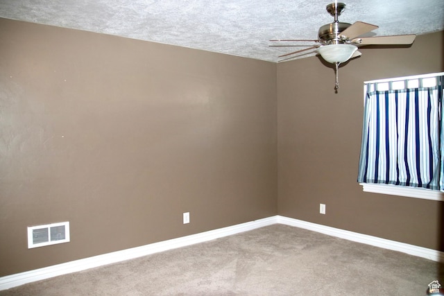 270 Amsterdam Dr, Stansbury Park, UT 84074 - unfurnished room featuring a ceiling fan, carpet flooring, and a textured ceiling