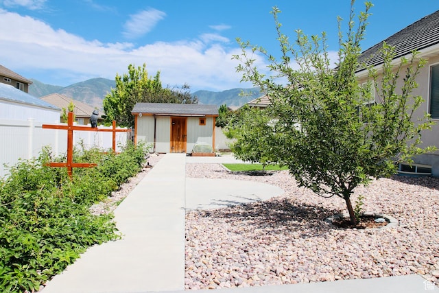270 Amsterdam Dr, Stansbury Park, UT 84074 - view of yard with a mountain view and a storage shed