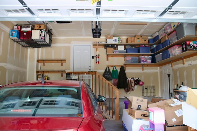 270 Amsterdam Dr, Stansbury Park, UT 84074 - garage with a garage door opener