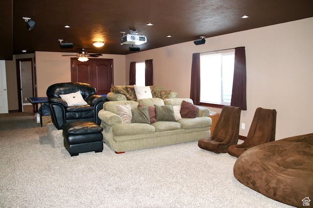 270 Amsterdam Dr, Stansbury Park, UT 84074 - home theater room featuring carpet flooring, healthy amount of natural light, ceiling fan, and recessed lighting