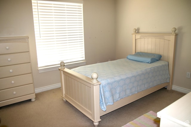 270 Amsterdam Dr, Stansbury Park, UT 84074 - bedroom with baseboards and light colored carpet