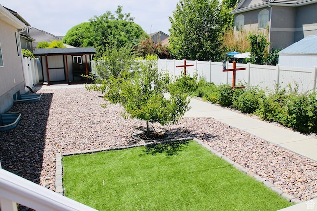 270 Amsterdam Dr, Stansbury Park, UT 84074 - fenced backyard with a storage shed