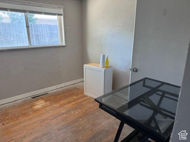 112 N Quincy Ave E, Ogden, UT 84404 - office area with wood finished floors and a textured wall