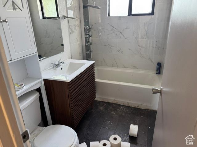 112 N Quincy Ave E, Ogden, UT 84404 - full bath with vanity, healthy amount of natural light, and shower / washtub combination