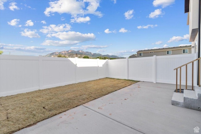 211 W 815 N Unit 19, Nephi, UT 84648 - fenced backyard featuring a patio area and a mountain view