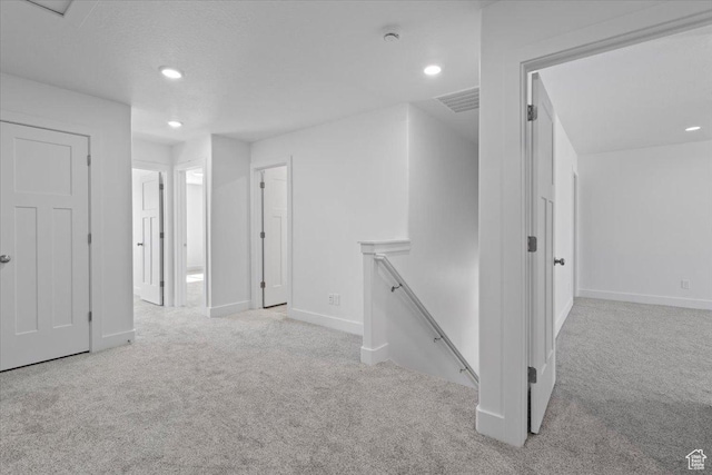 211 W 815 N Unit 19, Nephi, UT 84648 - hallway with an upstairs landing, carpet, and recessed lighting