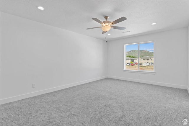 211 W 815 N Unit 19, Nephi, UT 84648 - spare room featuring a ceiling fan, a textured ceiling, recessed lighting, and carpet