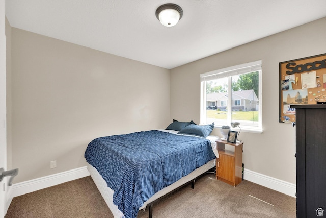 126 N Balsam Way W, Price, UT 84501 - carpeted bedroom featuring baseboards