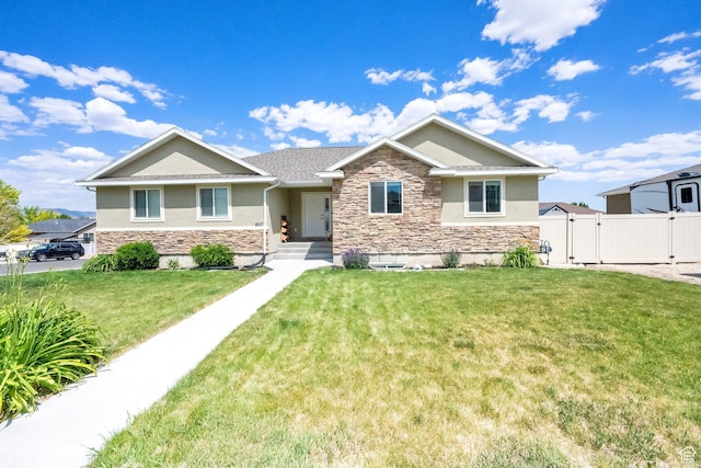 126 N Balsam Way W, Price, UT 84501 - view of front of home featuring stone siding, stucco siding, and a gate
