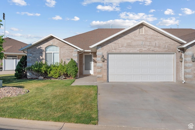 347 N 220 W, Salem, UT 84653 - single story home featuring a front yard, driveway, an attached garage, and brick siding