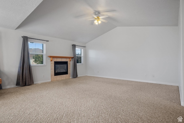 347 N 220 W, Salem, UT 84653 - unfurnished living room featuring ceiling fan, carpet floors, vaulted ceiling, and a tile fireplace