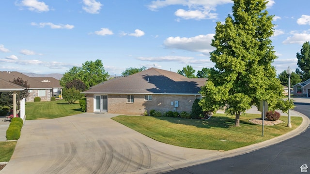 347 N 220 W, Salem, UT 84653 - view of side of property featuring a yard, brick siding, and driveway