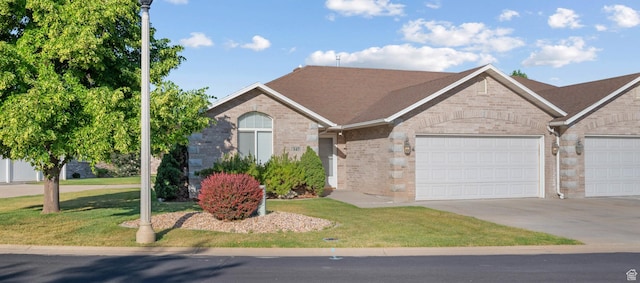 347 N 220 W, Salem, UT 84653 - ranch-style home featuring an attached garage, concrete driveway, brick siding, and a front yard