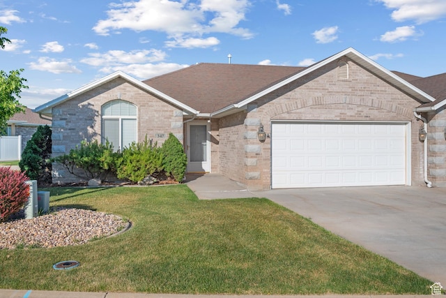 347 N 220 W, Salem, UT 84653 - single story home with driveway, a front lawn, an attached garage, brick siding, and a shingled roof