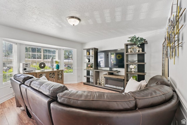 1213 E 540 N, Spanish Fork, UT 84660 - living area with wood finished floors and a textured ceiling