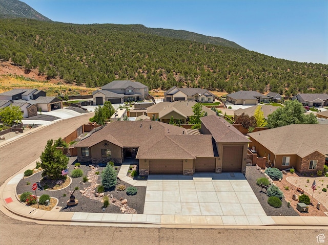 1283 W 1750 S, Cedar City, UT 84720 - aerial perspective of suburban area featuring a forest and a mountain backdrop