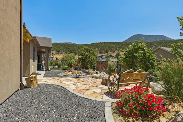 1283 W 1750 S, Cedar City, UT 84720 - view of yard with a mountain view and a patio area