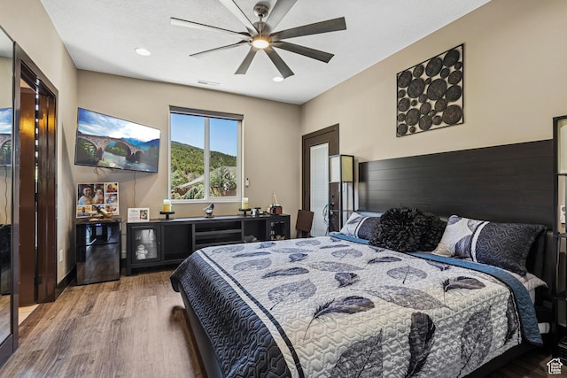 1283 W 1750 S, Cedar City, UT 84720 - bedroom featuring wood finished floors, ceiling fan, and freestanding refrigerator