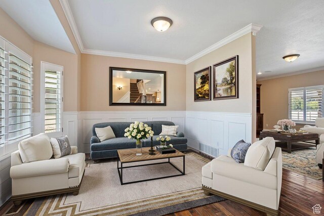 2131 S 1230 W, Syracuse, UT 84075 - living area featuring ornamental molding, a wainscoted wall, and wood finished floors