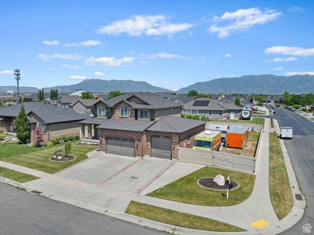 2131 S 1230 W, Syracuse, UT 84075 - view of front of home with a residential view, a garage, a gate, and a mountain view