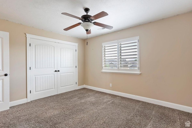 2131 S 1230 W, Syracuse, UT 84075 - unfurnished bedroom with carpet flooring, a closet, and a ceiling fan