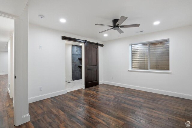 2131 S 1230 W, Syracuse, UT 84075 - unfurnished bedroom featuring wood finished floors, a barn door, recessed lighting, and ceiling fan