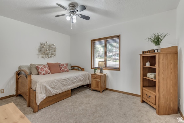 685 S Woodland Hills Dr, Woodland Hills, UT 84653 - bedroom with light carpet, a textured ceiling, and ceiling fan