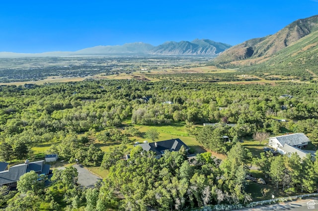 685 S Woodland Hills Dr, Woodland Hills, UT 84653 - aerial view of property and surrounding area with a mountain backdrop and a heavily wooded area