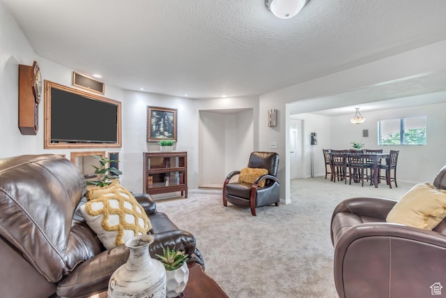 685 S Woodland Hills Dr, Woodland Hills, UT 84653 - carpeted living room with a textured ceiling and baseboards