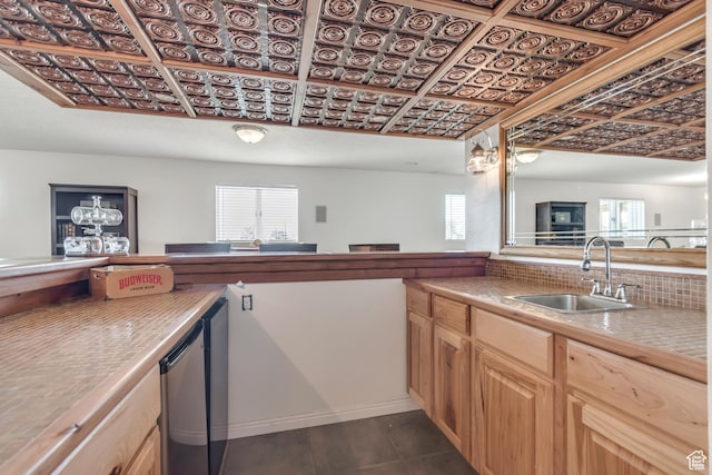 685 S Woodland Hills Dr, Woodland Hills, UT 84653 - kitchen featuring plenty of natural light, an ornate ceiling, decorative backsplash, light countertops, and dishwasher