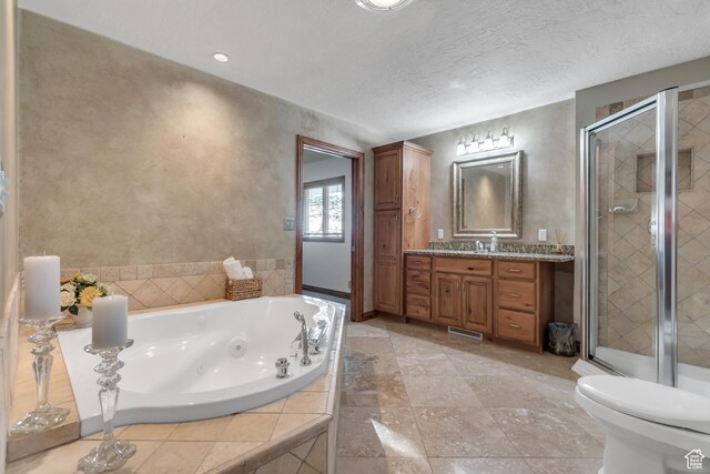 685 S Woodland Hills Dr, Woodland Hills, UT 84653 - full bathroom with a tub with jets, vanity, and a shower stall