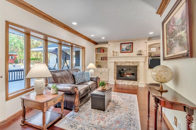 685 S Woodland Hills Dr, Woodland Hills, UT 84653 - living area with healthy amount of natural light, recessed lighting, wood finished floors, a fireplace, and ornamental molding