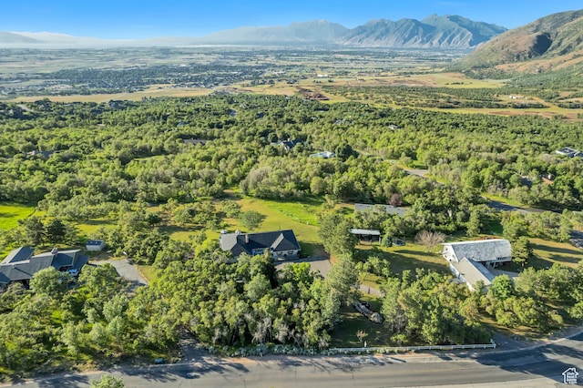 685 S Woodland Hills Dr, Woodland Hills, UT 84653 - aerial overview of property's location featuring a mountain backdrop and a forest