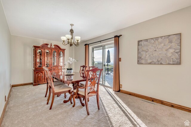 685 S Woodland Hills Dr, Woodland Hills, UT 84653 - dining room with a chandelier and light carpet