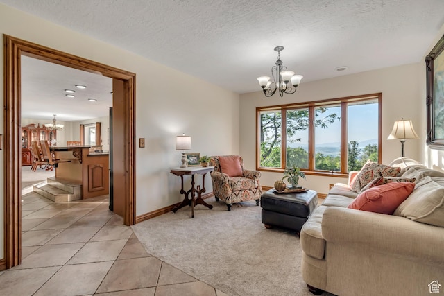 685 S Woodland Hills Dr, Woodland Hills, UT 84653 - living room with a chandelier, light tile patterned flooring, light carpet, and recessed lighting
