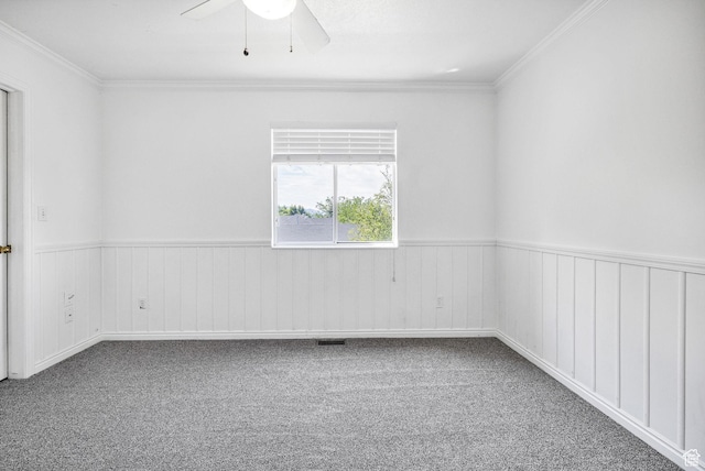 672 E Center St, Providence, UT 84332 - empty room with carpet flooring, a ceiling fan, ornamental molding, and wainscoting