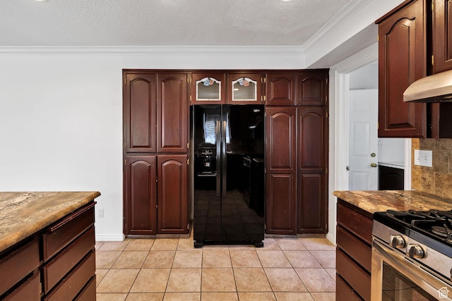 672 E Center St, Providence, UT 84332 - kitchen with black fridge, crown molding, light tile patterned floors, stainless steel range with gas stovetop, and tasteful backsplash